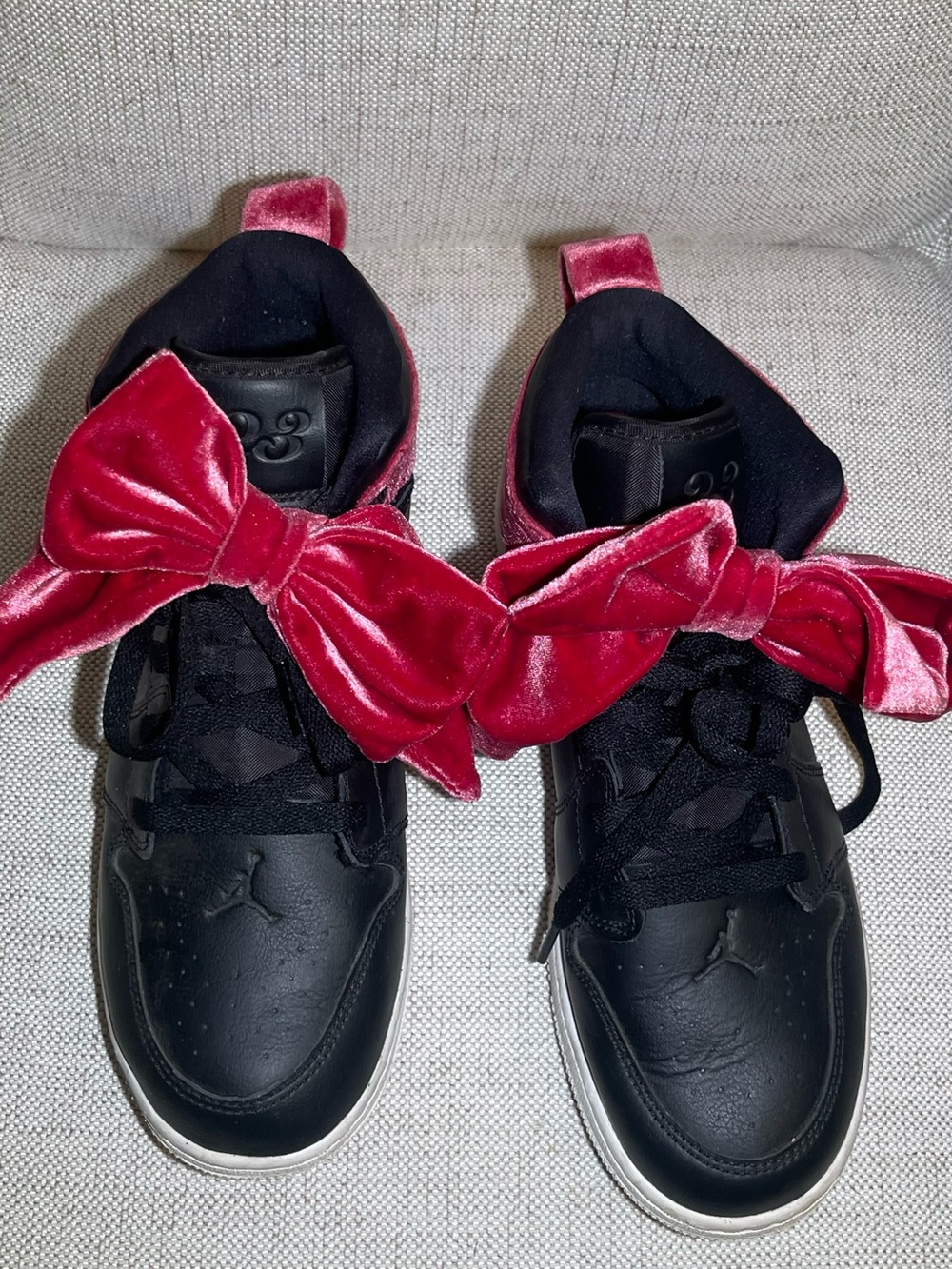 Jordan Kids Black Sneakers with Pink Velvet Bow Accents